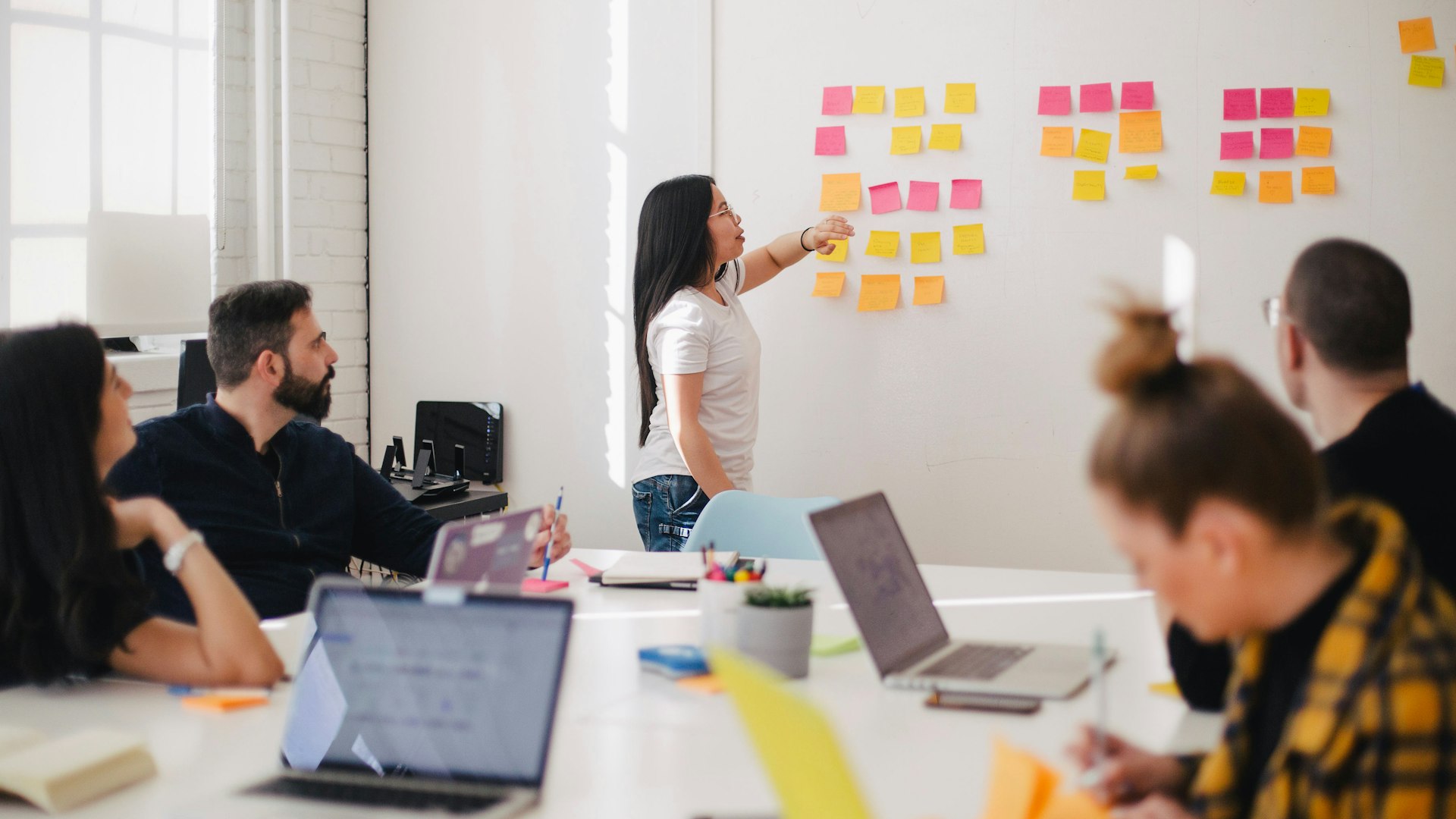 Consulting professionals in a strategy meeting — MBB case interview preparation